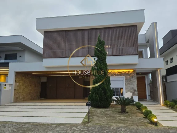 Imagem Sobrado em condomínio, 5 Dormitórios (4 Suítes), Jardim do Golfe 3.
