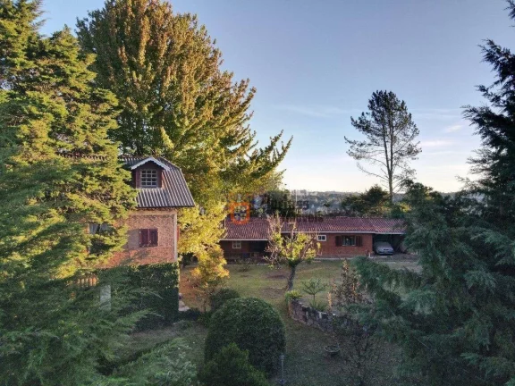 Foto do imóvel Casa com 3 dormitórios à venda, 280 m² por R$ 1.220.000 - Alto Do Capivari - Campos do Jordão/SP