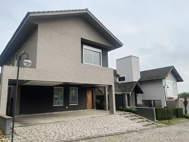 Foto do imóvel Casa 4 dormitórios em condominio fechado em Santa Felicidade