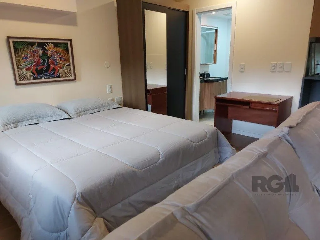 Imagem Apartamento stidio com 1 dormitório, 1 vaga de garagem no Bairro Auxiliadora.