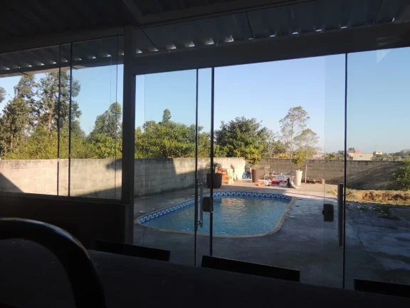 Imagem Casa à venda em Imbituba-SC, Alto Arroio: 4 quartos, 1 suíte, piscina e 150m² - Imperdível!