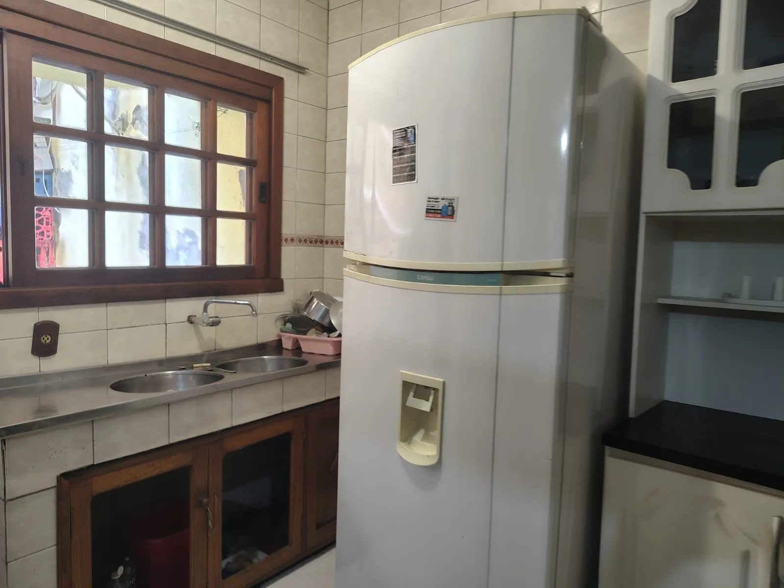 Imagem Casa de 4 dormitórios, 1 suíte e 4 vagas de garagem no bairro Cavalhada.