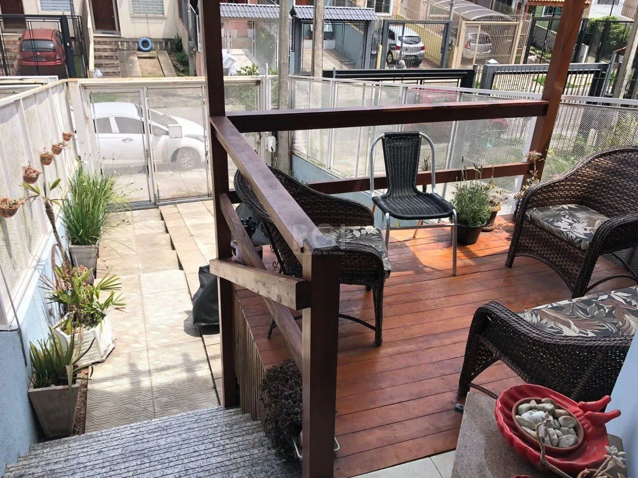 Imagem Casa com 3 dormitórios 2 suítes, área gourmet, vaga de estacionamento, Guarujá, Porto Alegre RS