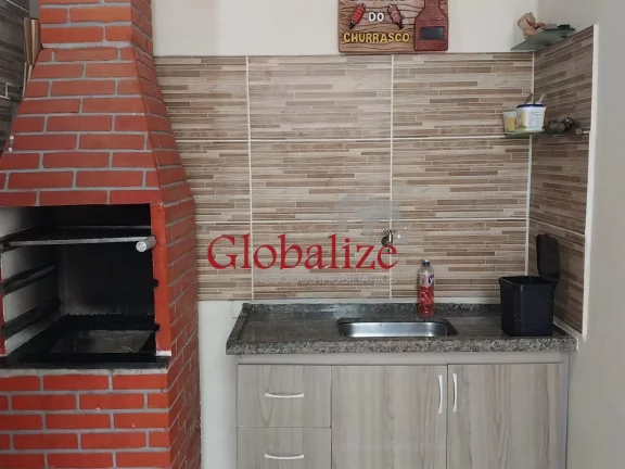 Imagem Casa térrea à venda com 125m², 2 quartos, churrasqueira, área coberta, vaga de garagem coberta por R$390.000,00 em Santos