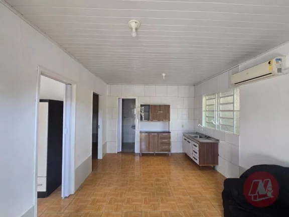 Imagem Casa com 2 dormitórios para alugar, 58 m² por R$ 1.615,00/mês - Medianeira - Porto Alegre/RS