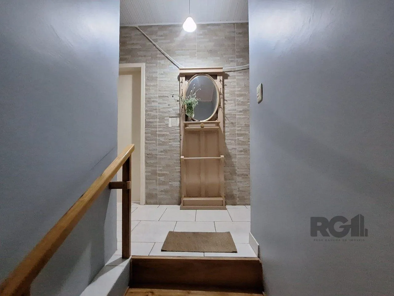 Imagem Casa com 3 dormitórios, suíte, lareira, Jardim Algarve em Alvorada - RS.