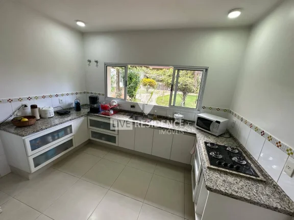 Imagem Excelente casa térrea com 4 suítes no Village das Palmeiras!