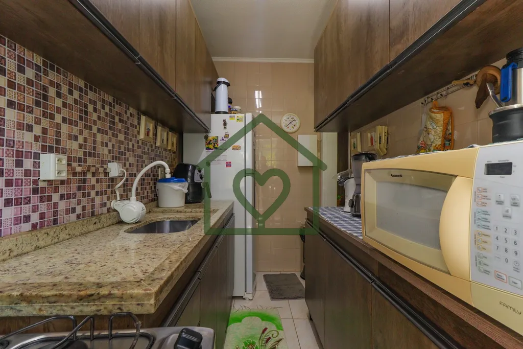 Imagem Apartamento no bairro Camaquã com 61m2 privativos, localizado a um lance de escada, composto por do...