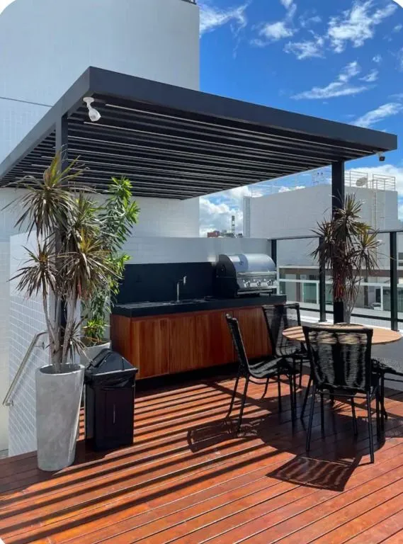 Imagem Loft moderno no Bessa, a 50m do mar, com suíte climatizada, coworking, piscina e segurança 24h.