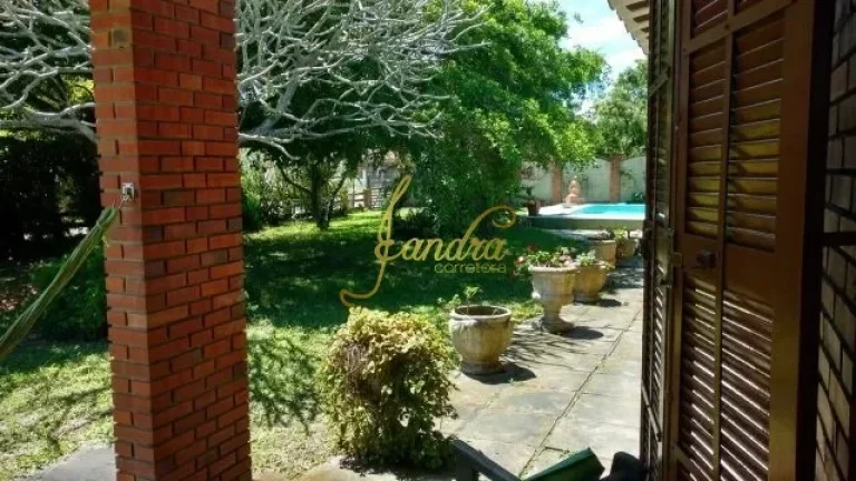 Imagem Casa em Atlântida 02 terrenos! Composta por 03 dormitórios, 01 suíte