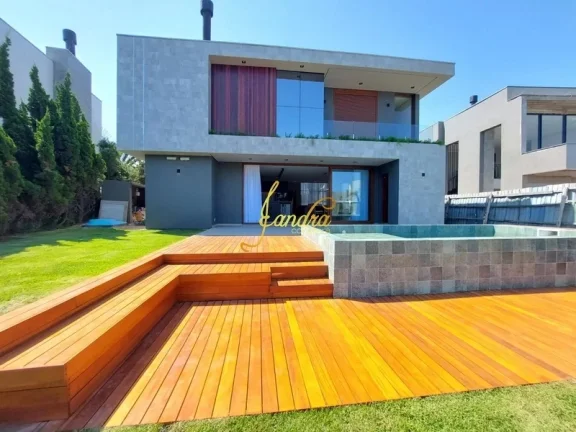 Imagem Sobrado beira de lago com 05 suítes piscina mobiliado e decorado