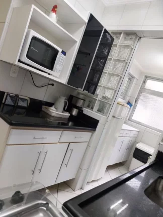 Imagem Apartamento com 4 dormitórios à venda, 113 m² por R$ 660.000,00 - Praia Pitangueiras - Guarujá/SP