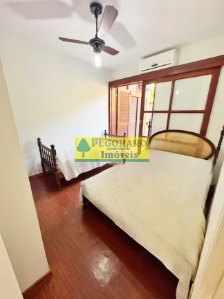 Imagem Casa de luxo à venda em Caraguatatuba-SP, bairro Martim de Sá: 4 quartos, 2 suítes, 2 salas, 3 banheiros, 3 vagas de garagem, 249m².