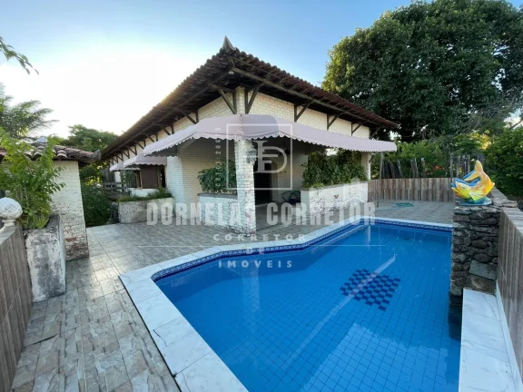 Imagem CASA ALTO PADRÃO COM 5 QUARTOS, DE FRENTE PARA O MAR, NA ESQUINA DA AVENIDA PRINCIPAL