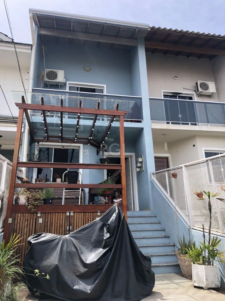 Imagem Casa com 3 dormitórios 2 suítes, área gourmet, vaga de estacionamento, Guarujá, Porto Alegre RS