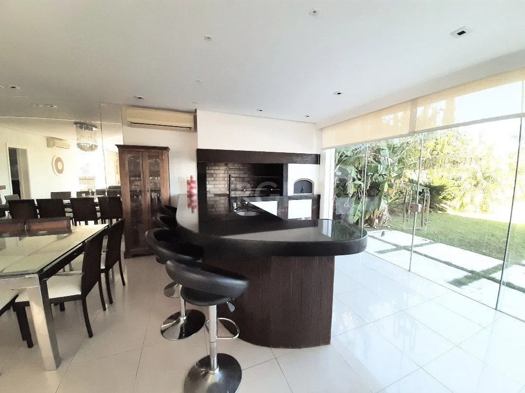 Imagem Casa Condominio para Venda - 470m², 4 dormitórios, sendo 3 suites, 3 vagas - Terra Ville