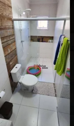 Imagem Sobrado triplex com 2 suítes à venda, 199 m² por R$ 675.000 - Massaguaçu - Caraguatatuba/SP