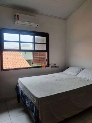 Imagem Sobrado com 2 dormitórios à venda, 70 m² por R$ 375.000 - Pontal de Santa Marina - Caraguatatuba/SP