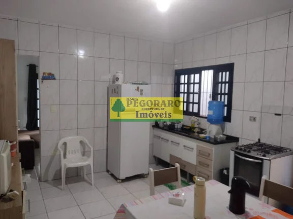 Imagem Casa à venda em Caraguatatuba-SP, bairro Rio do Ouro: 2 quartos, 2 salas, 2 banheiros, 2 vagas de garagem, 127m² - com piscina e churrasqueira!