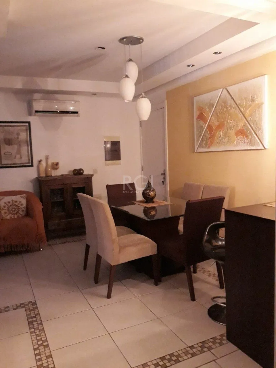 Imagem Apartamento de três dormitórios, suíte e uma vaga de garagem no bairro Cristo Redentor em Porto Alegre.