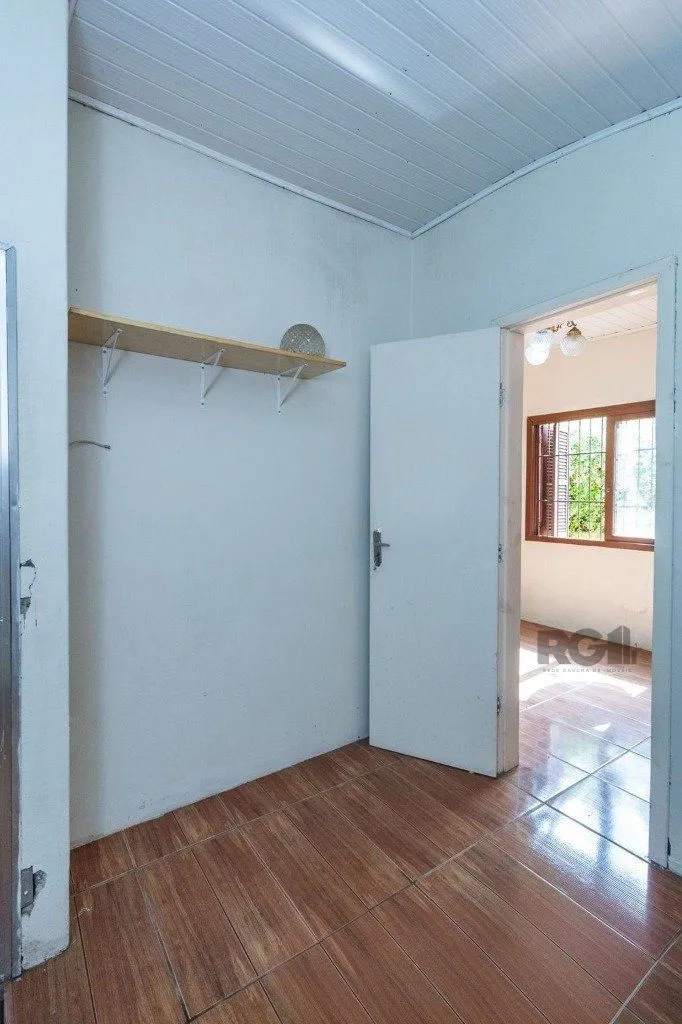 Imagem Casa de 4 dormitórios no bairro Camaquã