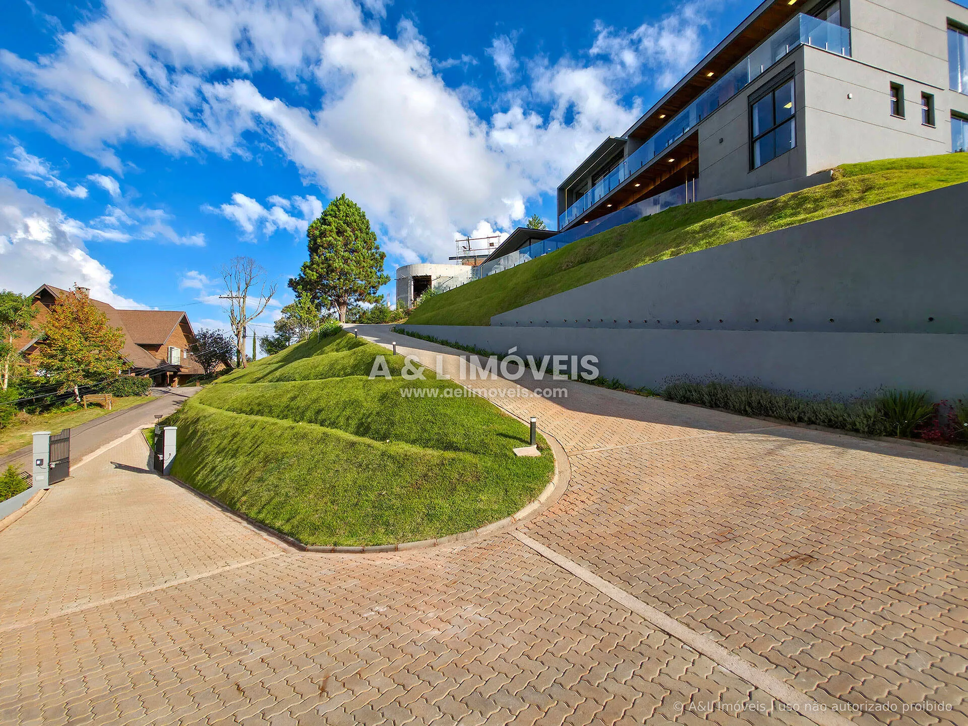 Imagem Casa à venda em Campos do Jordão | Iporanga | 4 suítes | Spa