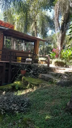 Imagem Casa Rústica em Garopaba-SC: 3 Suítes, Vista Panorâmica, Jacuzzi e 3000m² de Terreno