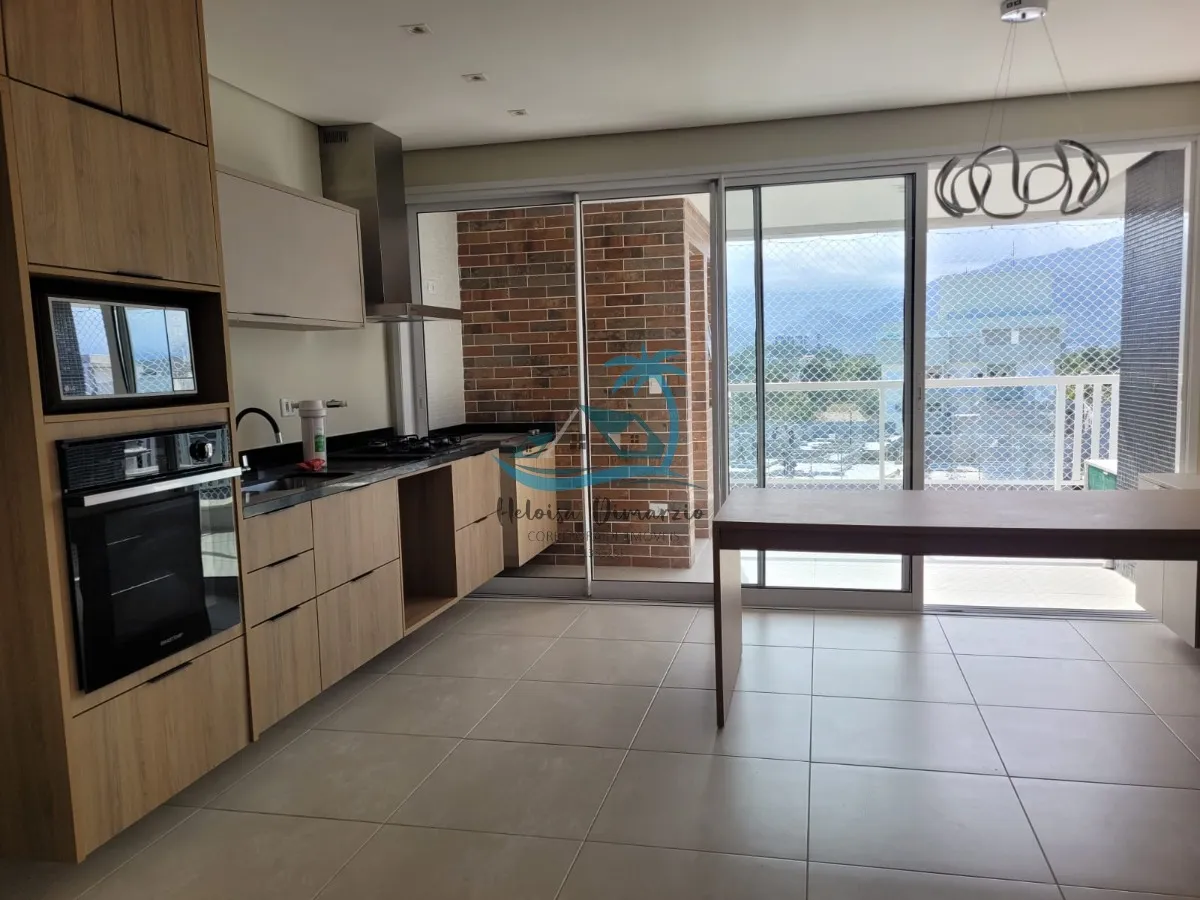 Imagem Excelente Apartamento com 3 dormitórios semi mobiliado e vista para o mar, a venda a 250 metros da orla de Itagua em Ubatuba.