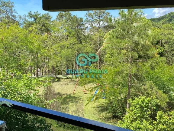 Imagem 3 dormitórios, 1 suíte com closet, pequena vista para o mar, sala para dois ambientes, varanda com vista para área verde, cozinha americana