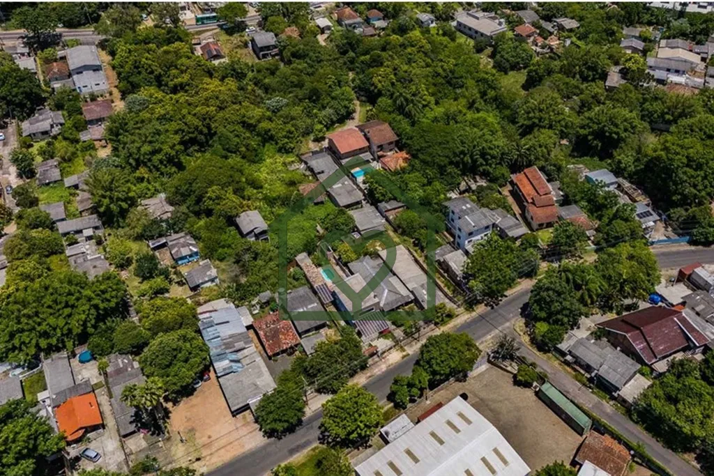Imagem Terreno na Zona Sul de Porto Alegre, no bairro Vila Nova. Medido 1.069 m² com 11,54 metros de frent...