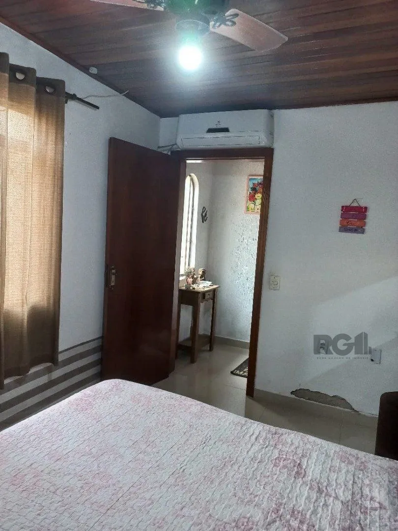 Imagem Casa 2 dormitórios com piscina na Vila Nova Porto Alegre