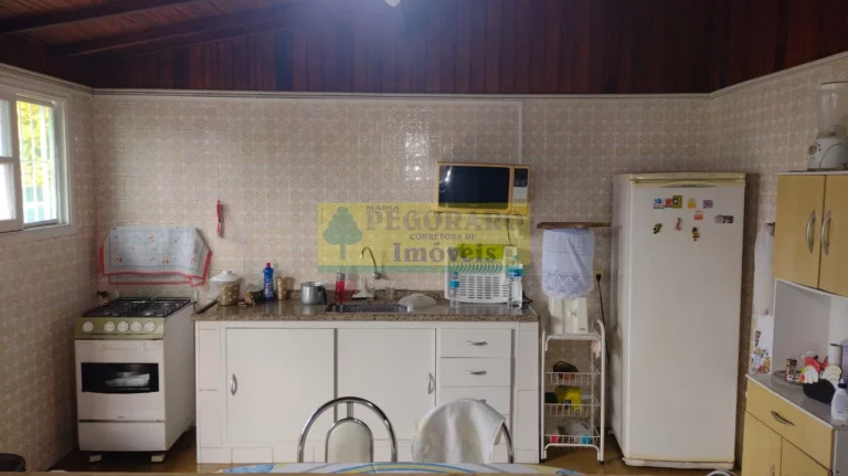 Imagem Imperdível Casa de 4 Quartos na Prainha, Caraguatatuba-SP: 2 Suítes, 2 Salas, 4 Banheiros, 4 Vagas de Garagem!