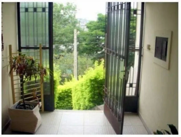 Imagem Sobrado para Venda - 240m², 3 dormitórios, sendo 1 suites, 1 vaga - Partenon