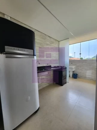 Imagem Apartamento à venda no Jardim dos Pássaros, Guarujá - 2 dormitórios, cozinha, garagem e mais!