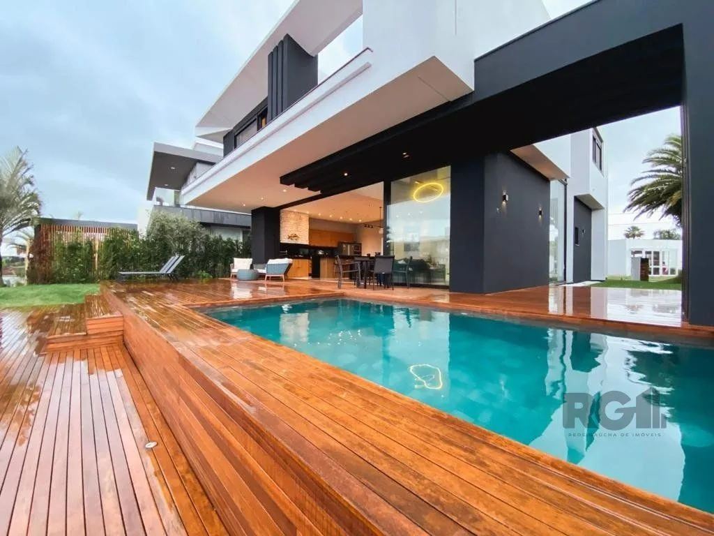 Imagem Casa de Condomínio em Atlântida Sul