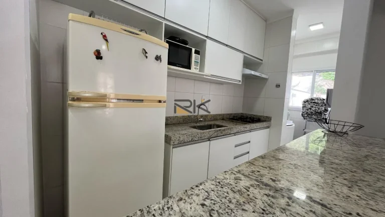 Imagem APARTAMENTO PRAIA GRANDE com 2 dormitórios sendo 1 suíte,1 vaga de garagem,varanda gourmet com churrasqueira,sala 2 ambientes