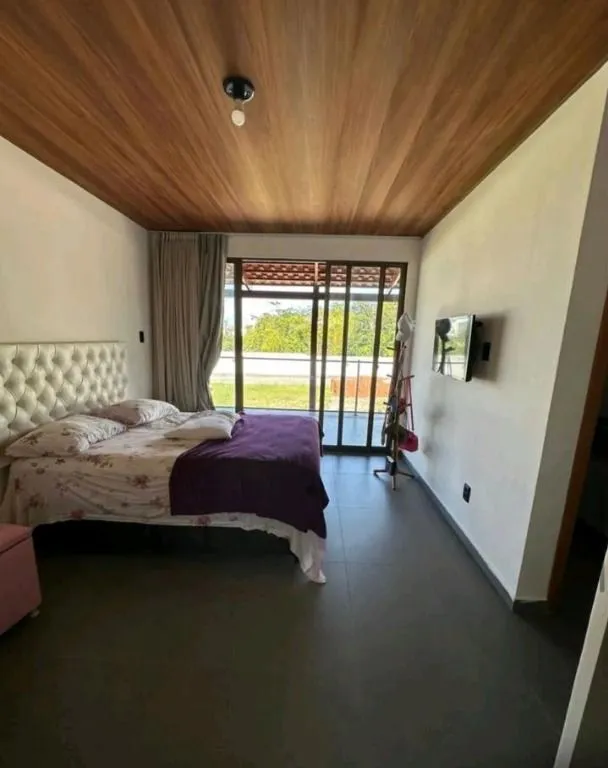 Imagem Mansão mobiliada com 5 suítes no Condomínio Alamoana. Sofisticação, automação, segurança 24h e lazer completo em Cabedelo.