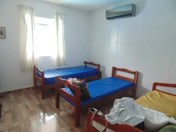 Imagem Casa com 3 dormitórios à venda, 142 m² por R$ 700.000,00 - Maracanã - Praia Grande/SP