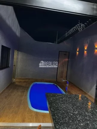 Imagem Casa à venda no Jardim Espanha, Uberaba | 2 dormitórios, suíte, piscina e varanda gourmet