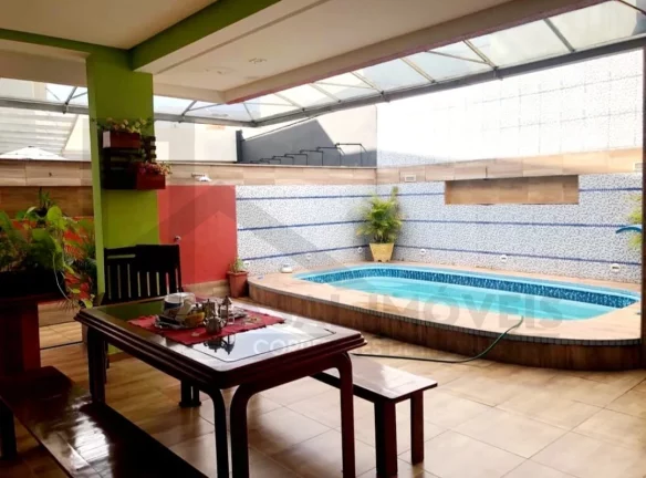 Imagem CASAL IMÓVEIS VENDE CASA TERREA MONTENEGRO BOULEVARD 3 SUÍTES