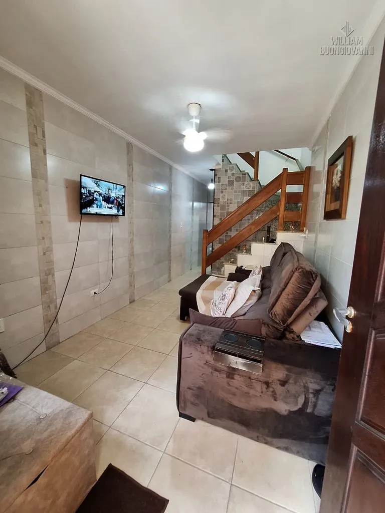 Imagem Casa de condomínio 2 dormitórios com piscina em Mongaguá