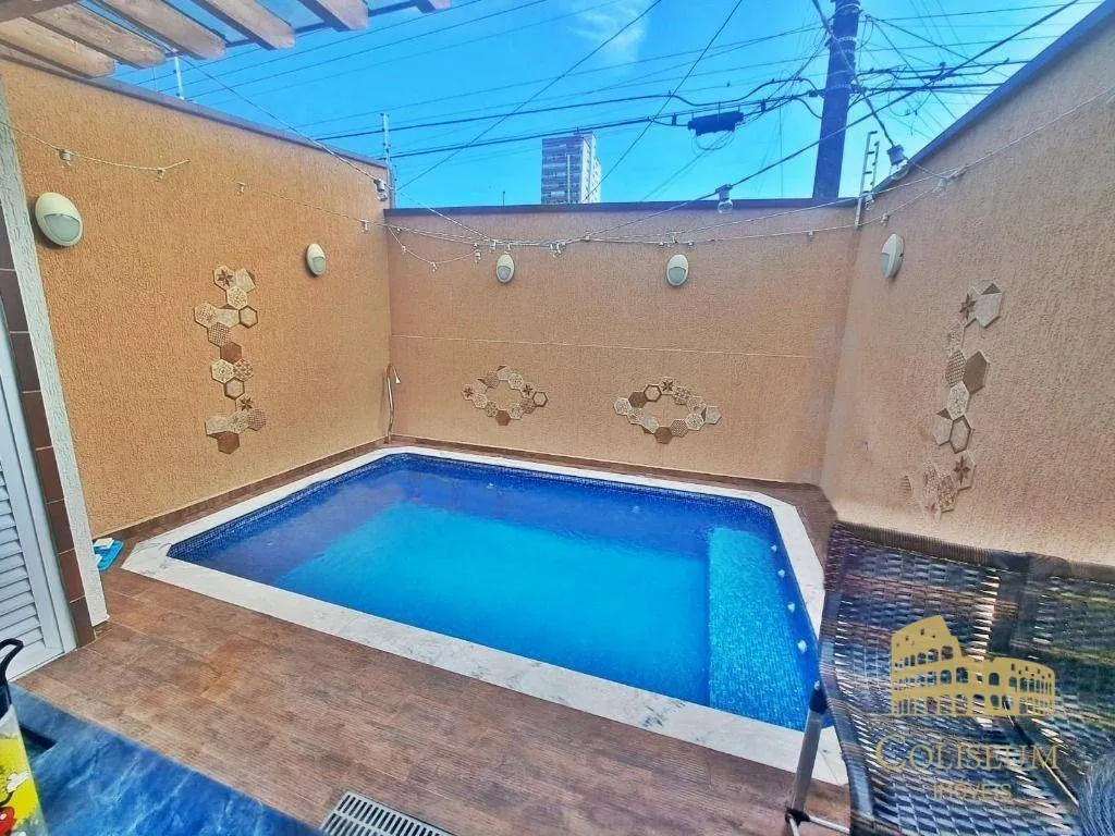 Foto do imóvel Casa com 2 dormitórios à venda, 94 m² por R$ 700.000,00 - Vilamar - Praia Grande/SP