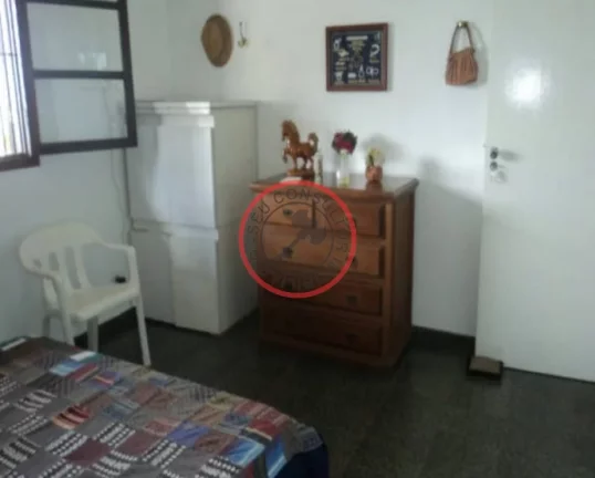 Imagem Casa terrea de frene a praia de Boiçucanga, com 2 quartos, sala cozinha, banheiro ,varanda e Área de serviço ,garagem