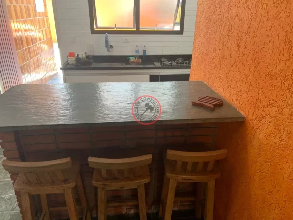 Imagem CASA COM ESCRITURA DEFINITIVA 50 METROS DA PRAIA 2 QUARTOS 2 BANHEIROS 2 VAGAS PISCINA COLETIVA PRONTO PARA MORAR VISTA PARA O MAR