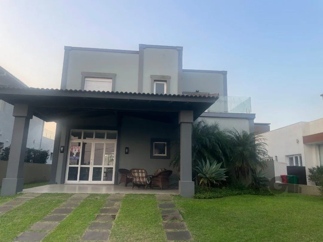 Casa de Condomínio em Atlântida Sul