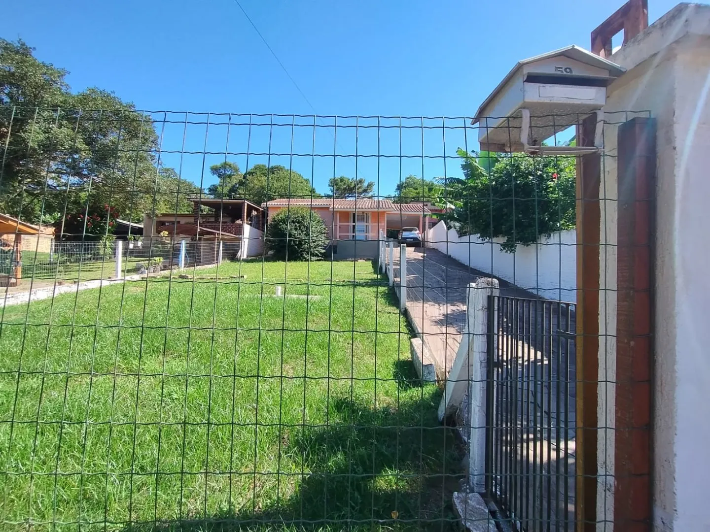 Imagem Casa com quintal a venda no bairro Tarumã em Viamão