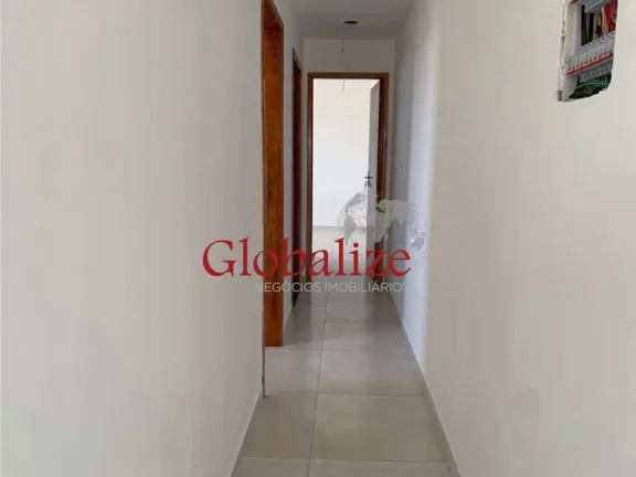 Imagem Casa sobreposta alta à venda com 72m², 2 quartos, 1 suíte, churrasqueira por R$315.000,00 em Santos