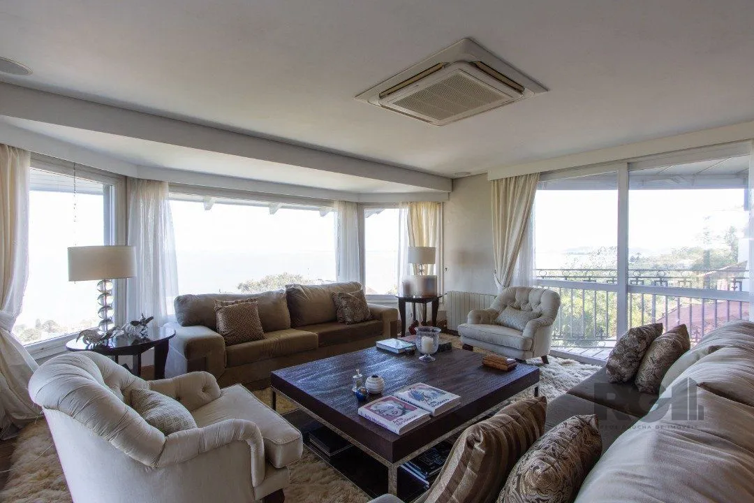Imagem Casa deslumbrante vista do Guaiba, 3 dormitórios, sendo 1 suite master com closet e banheira de hidro com vista para o rio