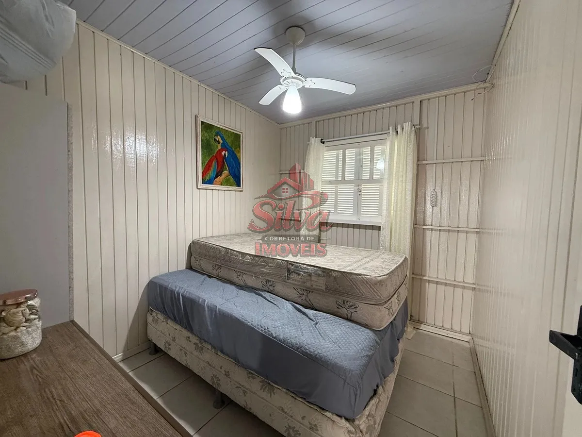 Imagem Casa 3 dormitórios com piscina a 250m do mar