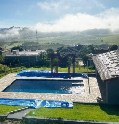 Imagem Casa com 3 dormitórios à venda, 224 m² por R$ 1.100.000,00 - Carneiros - Piranguinho/MG